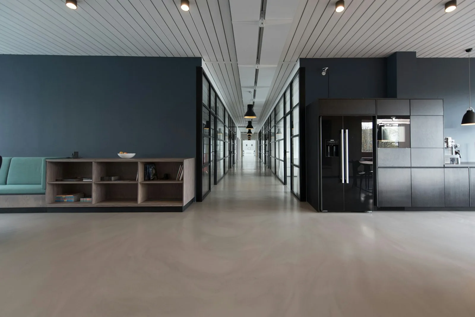 Wide architectural installation of 22-Seat Cantilevered AV Executive Conference Suite & Sound-Baffled Millwork